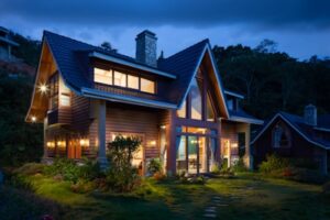 Modern home glowing at dusk in a Burnaby neighborhood