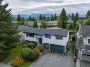 Aerial suburban home with mountain views