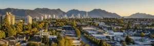 Burnaby skyline overlooking residential neighborhood and mountains