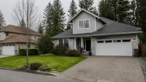 Modern suburban house with green lawn